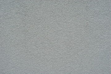 Plaster on a gray wall. Concrete wall texture close up.