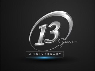 13 Years Anniversary Celebration. Anniversary logo with ring and elegance silver color isolated on black background, vector design for celebration, invitation card, and greeting card