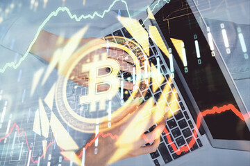 Double exposure of woman hands working on computer and blockchain theme hologram drawing. Top View....