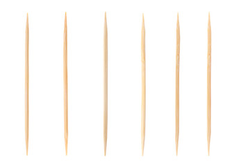 Set with wooden toothpicks on white background