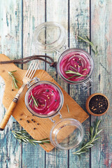 Pickled red onion salad in two jars