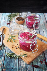 Obraz na płótnie Canvas Pickled red onion salad in two jars