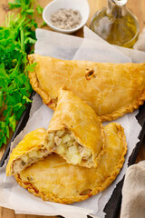 Savoury pastry Cornish pasty stuffed with chicken and potato