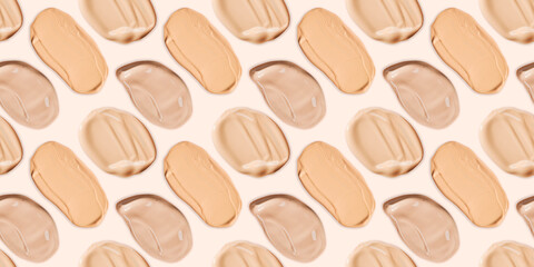Seamless pattern of liquid foundation cream swatch smear. Light beige makeup concealer stroke on a pale yellow background. Nude makeup base swipe