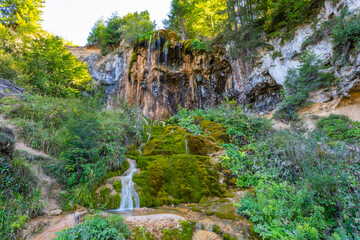 Fototapeta na wymiar Pisoaia waterfall in the Carpathian mountains, Apuseni, Romania, Alba County