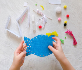 Craft from felt . Creative activities at home with children. Sewing soft toys, hobby. Workplace.