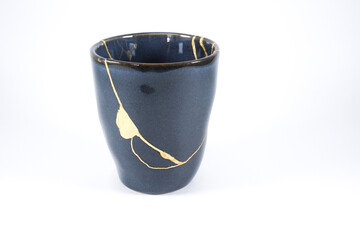 Broken black cup, broken heart representation