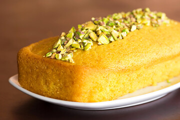 Sfouf Lebanese semolina turmeric pie. Arabic cuisine. Vegan dessert.  Selective focus.