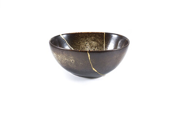 Broken heart Kintsugi bowl restored with gold