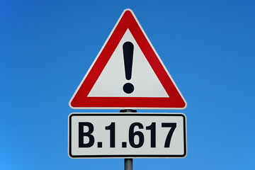 B.1.617 - Achtung Schild mit blauem Himmel