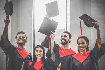 A company of graduates looking happy and cheerful