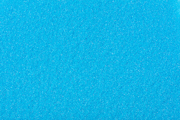 Fototapeta na wymiar Glitter wallpaper for your adorable desktop, shiny texture in gentle blue tone.