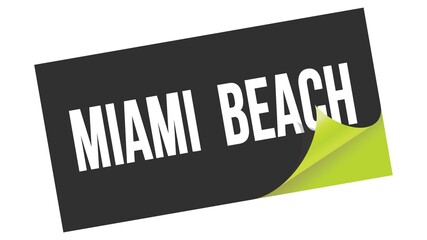 Obraz premium MIAMI BEACH text on black green sticker stamp.