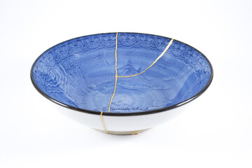 Antique white and blue Japanese plate, real gold restoration.