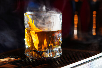 Glass of scotch whiskey and ice
