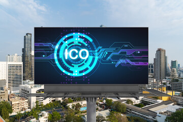 ICO hologram icon on billboard over panorama city view of Bangkok at day time. The hub of...