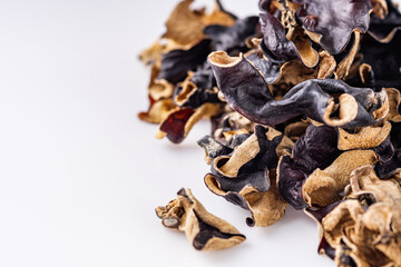 delicious asian black fungus mushroom on a white acrylic background
