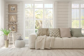 Fototapeta premium Minimalist living room in white color with sofa and summer landscape in window. Scandinavian interior design. 3D illustration