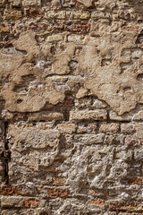 Old brick and plaster wall texture background
