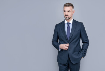 confident businessman man in businesslike suit, copy space, ceo