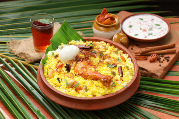 Chicken dum  Biryani_Indian Biriyani_wooden background
