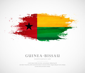 Obraz premium Abstract watercolor brush stroke flag for independence day of Guinea-Bissau