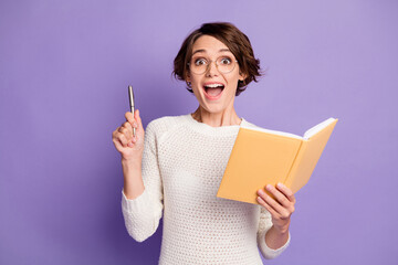 Photo portrait of smart female writer keeping pen got idea planner isolated on vibrant purple color background - obrazy, fototapety, plakaty