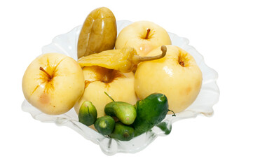 glass bowl with soaked apples and lightly salted vegetables