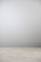 Old gray concrete base and white tile background. Front view with copy space for your product and text.