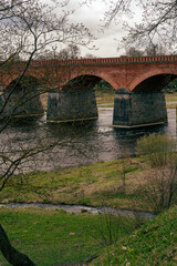 Landscape with Venta river and old Kuldiga brick bridge