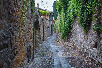 Old pedestrian street as a down from the Upper Bergamo to the Lower Bergamo. Italy.