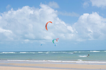 The kitesurf in the beach