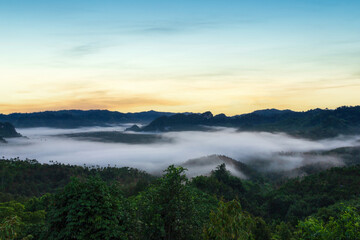 Beautiful views of mountains in the mist at sunrise time, Ranong