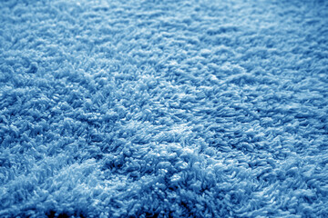 Bath towel texture with blur effect in navy blue color.
