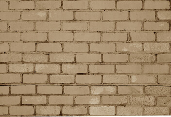 Pattern of brick wall with blur effect in brown tone.