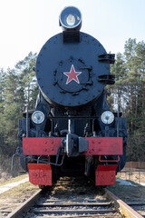 Obraz premium old steam locomotive on rails
