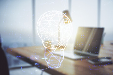 Creative light bulb hologram on modern laptop background, idea concept. Multiexposure