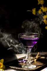Lavander coctail on dark and moody background.
