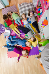 Fototapeta na wymiar Happy preschoolers after nap time at the kindergarten