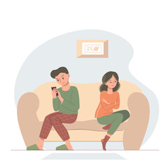 Conflicts and disagreements in the family. A young couple quarrels. A young woman and the man sitting on the couch upset.