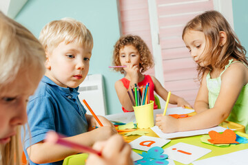 Preschool children learn english alphabet using cards