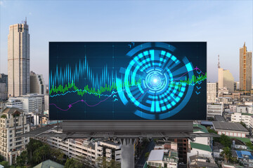 Forex and stock market chart hologram on road billboard over panorama city view of Bangkok. The financial center in Southeast Asia. The concept of international trading.