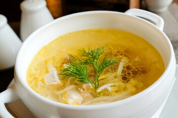 Chicken noodle soup. Small portion, no people