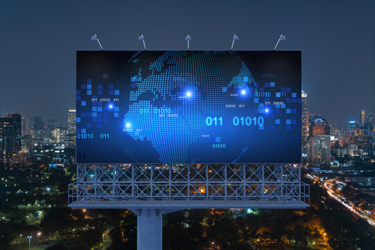 Hologram of Earth planet map on billboard over night panoramic cityscape of Bangkok. The concept of international companies in Southeast Asia.