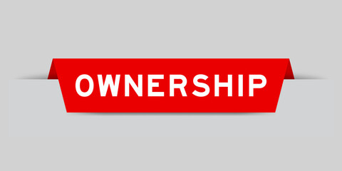 Red color inserted label with word ownership on gray background