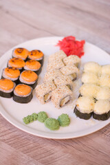 Various sushi on a plate close up