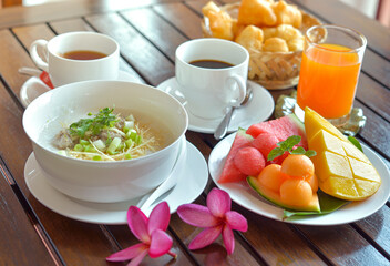 Congee with minced pork served slice ginger coriander and egg ,Asian Food breakfast