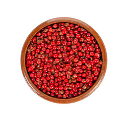 pink peppercorns seeds isolated on white background. Top view