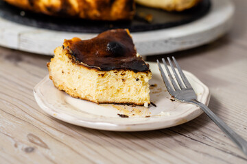 Basque burnt cheesecake piece on the plate
