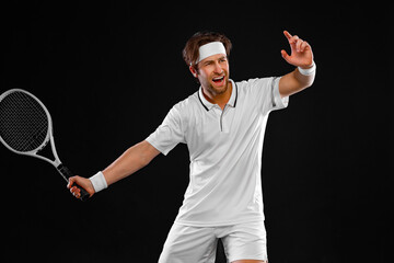 Tennis player with racket in white costume. Man athlete playing isolated on black background.